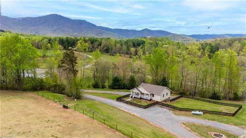 239 Violet Ridge Trl, Lowgap, NC, 27024-9296 | Card Image