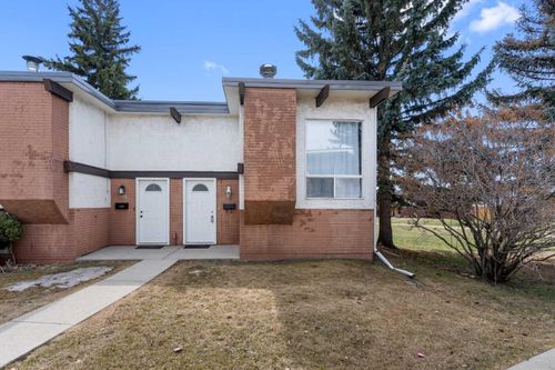 107 Pinemont Bay Ne, Home with 2 bedrooms, 1 bathrooms and 1 parking in Calgary AB | Card Image