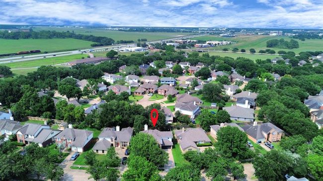 Bird’s-eye view of 235 Cedar Elm Ln, highlighting its prime location—ideally situated near Hwy 90 and the Westpark Tollway for effortless commuting and convenient access to surrounding areas. | Image 46