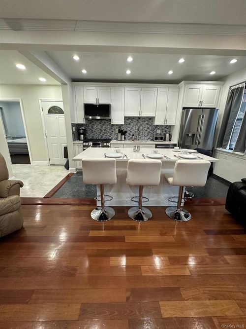 1-7713 Ditmars Blvd, East Elmhurst, NY, 11370-1293 | Card Image