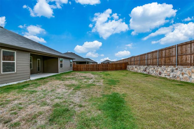 View of yard featuring a patio area | Image 23