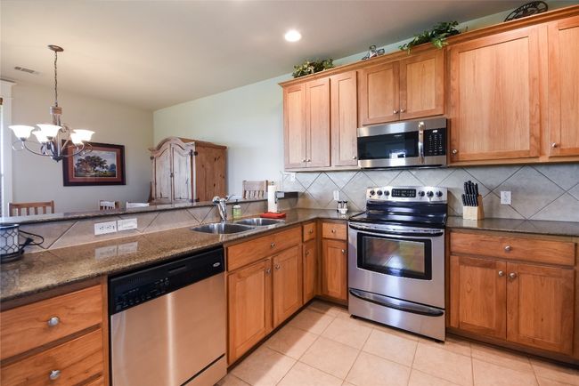 Kitchen with decorative backsplash | Image 4
