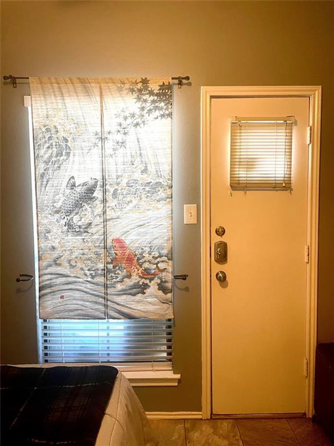 Doorway featuring tile patterned flooring | Image 10