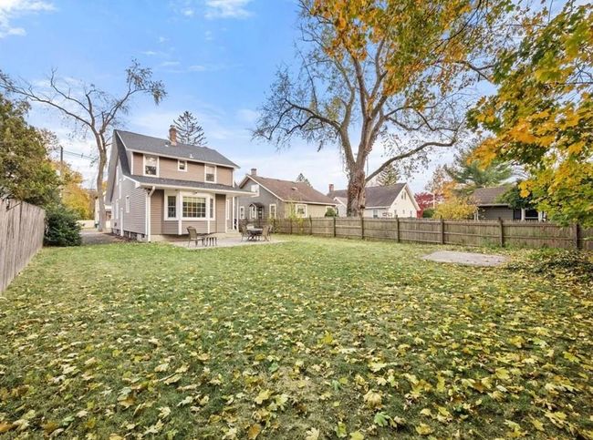 View of yard featuring a patio and a fenced backyard | Image 11