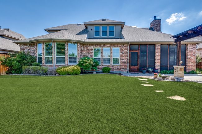 Enjoy beautiful water views of one of the neighborhood’s tranquil canals. A gated entry at the back of the property offers convenient access | Image 36