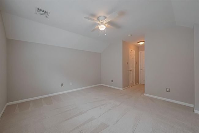 Fourth bedroom, with concave ceiling that gives spaciousness to this room. | Image 32