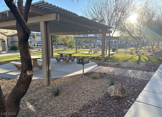 View of community with a yard and a pergola | Image 12
