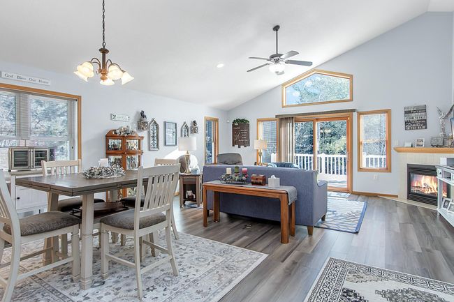 Open floor plan on main level in the kitchen/dining/living room | Image 26