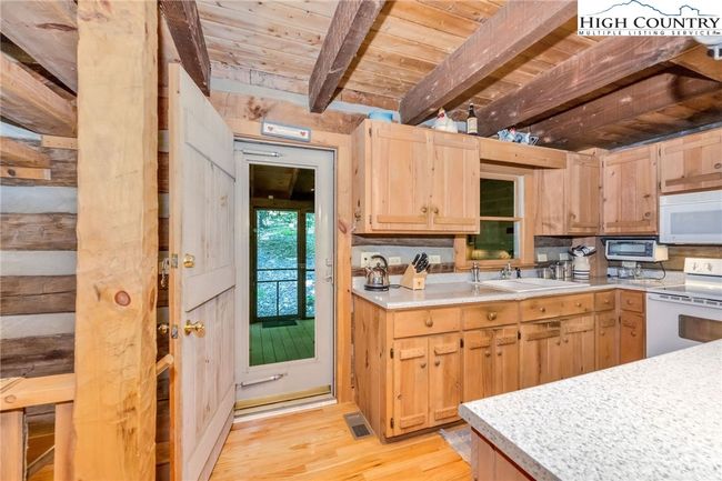 Enjoy seamless indoor-outdoor living and entertaining as the great room opens to multiple outdoor spaces. | Image 5