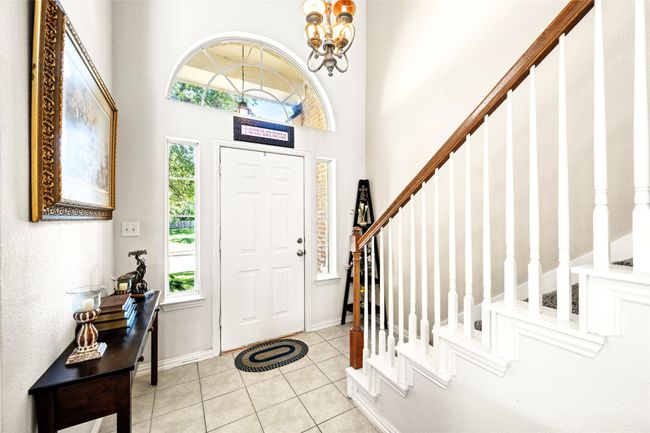 Entryway with stairs, and chandelier. | Image 7