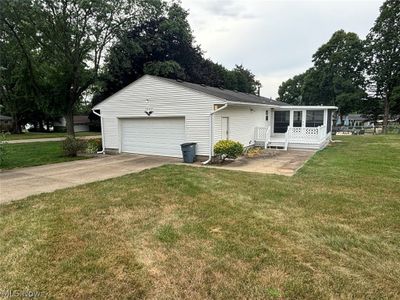 View of garage and backyard | Image 2