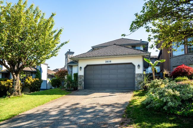 2616 Homesteader Way, House other with 4 bedrooms, 4 bathrooms and 2 parking in Port Coquitlam BC | Image 2