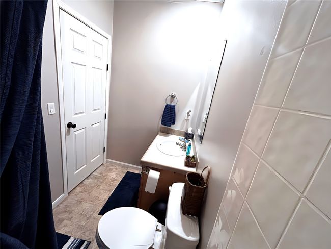 Bathroom with toilet and vanity | Image 22