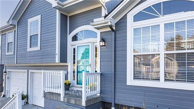 Property entrance with a garage | Image 2