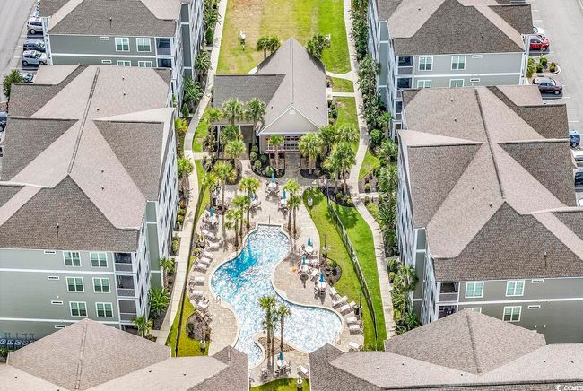 Community pool featuring a patio | Image 13