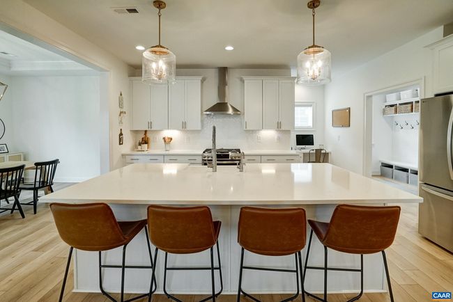 Seating for four at the large island. | Image 15