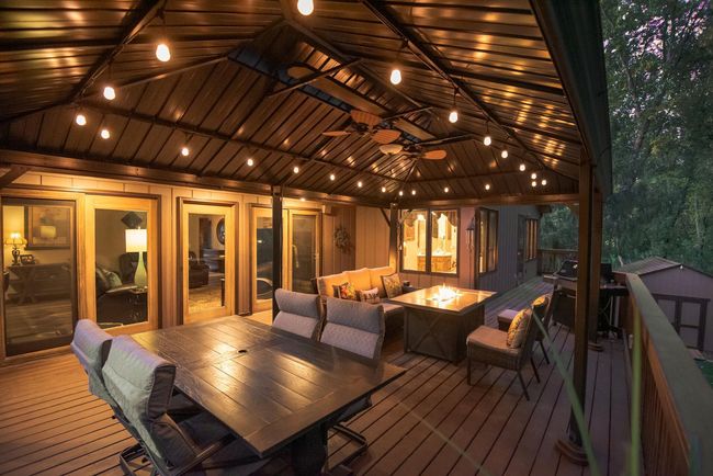 The gazebo will convey with the sale of the home - It offers a nice shaded area for relaxing and is complete with ceiling fans to help circulate air flow | Image 4