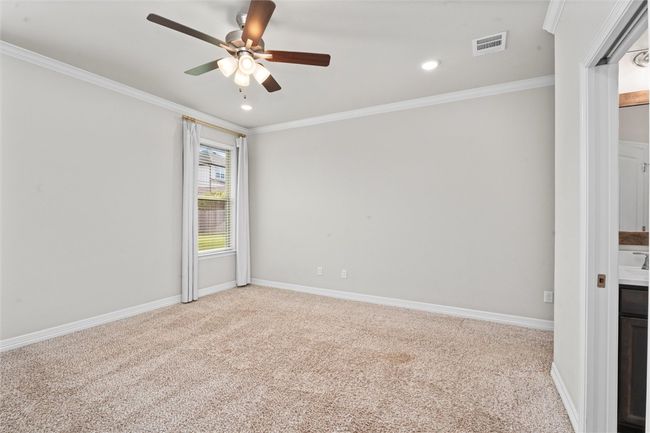 Spare room with light carpet, ornamental molding, ceiling fan, recessed lighting, and baseboards | Image 17