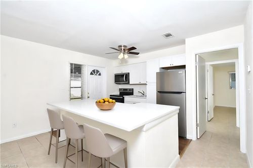 44 Tangelo Ct, LEHIGH ACRES, FL, 33936-7234 | Card Image