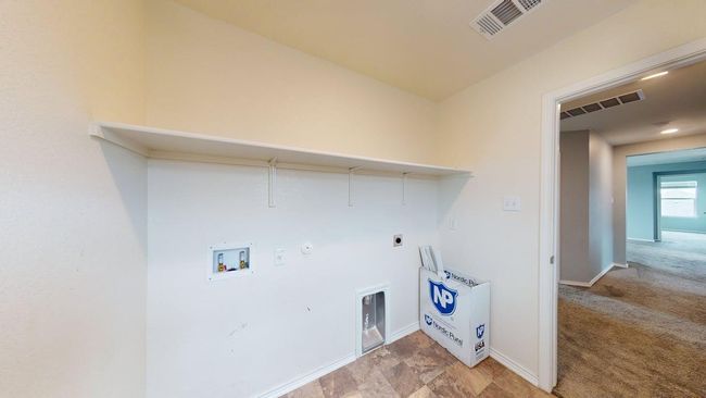 Laundry area featuring washer hookup, laundry area, electric dryer hookup, and visible vents | Image 32