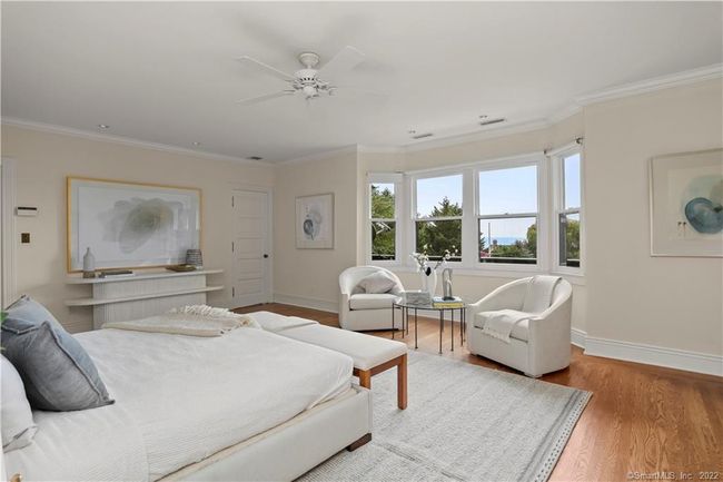 UNMATCHED // Primary suite is comprised of this spacious bedroom, 2 full baths, 2 walk in closets, sitting room and adjacent office. | Image 16