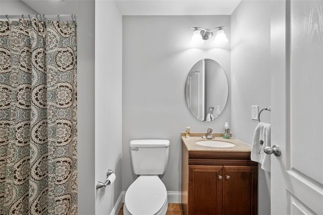 A 3rd full bathroom is found in the basement. Workout, then shower right after. | Image 41