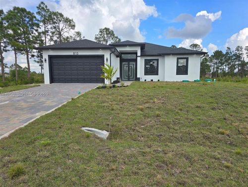 815 Anaconda Ave S, Lehigh Acres, FL, 33974-5562 | Card Image