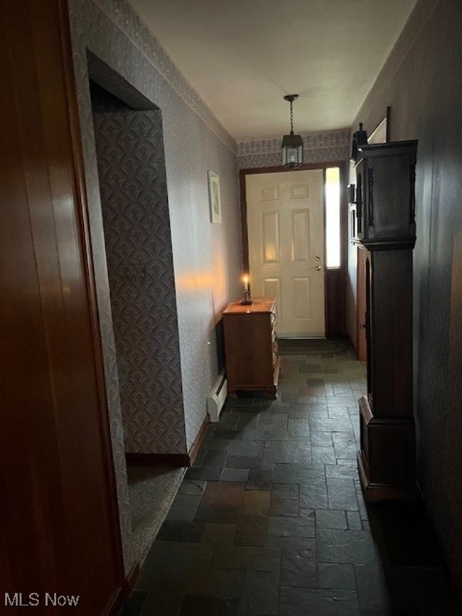 foyer has slate flooring | Image 24