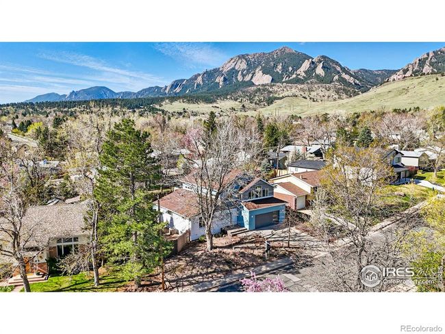 nestled on a sun-soaked, south-facing lot, it boasts 360-degree vistas--including jaw-dropping top-story views of the Flatirons and Devils Thumb. some of Boulders best hiking is a short stroll from your door. | Image 5
