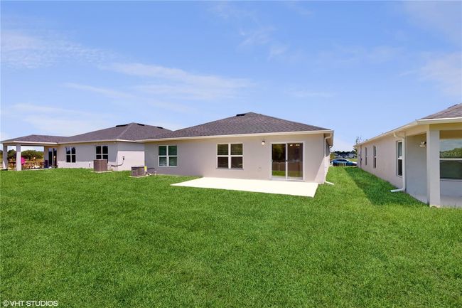 995 Gotthard Pass Drive, House other with 4 bedrooms, 2 bathrooms and null parking in Winter Haven FL | Image 3