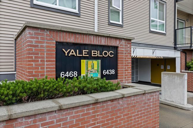 View of exterior entry featuring brick siding | Image 16