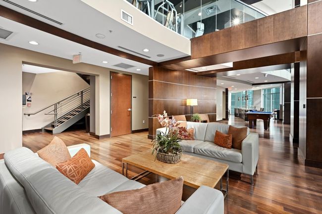 Lobby with stairs and a towering ceiling | Image 29