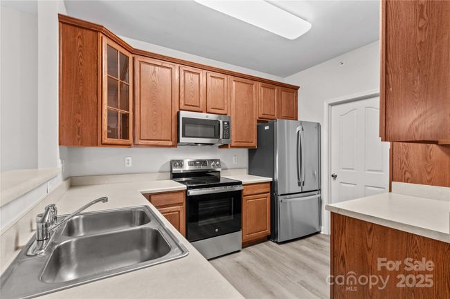 Kitchen has Brand New Stainless Steel Appliances w/ Warranty | Image 12