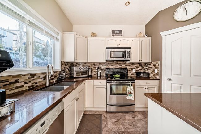 39 Bow Ridge Drive, House other with 3 bedrooms, 4 bathrooms and 2 parking in Cochrane AB | Image 8