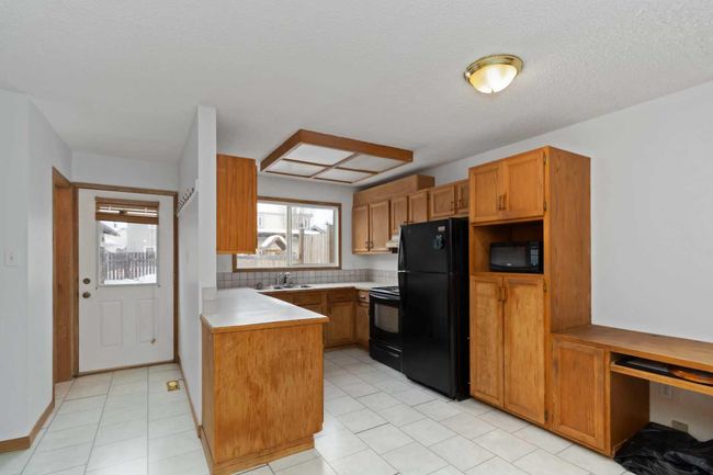180 Wolverine Drive, Home with 3 bedrooms, 2 bathrooms and 4 parking in Fort Mcmurray AB | Image 7