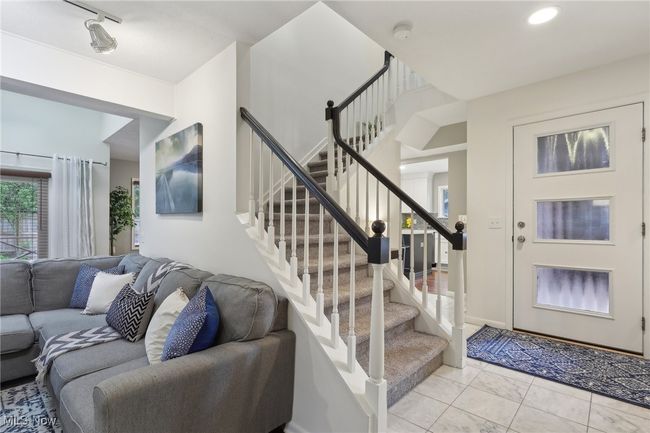 Foyer entrance with stairway | Image 6
