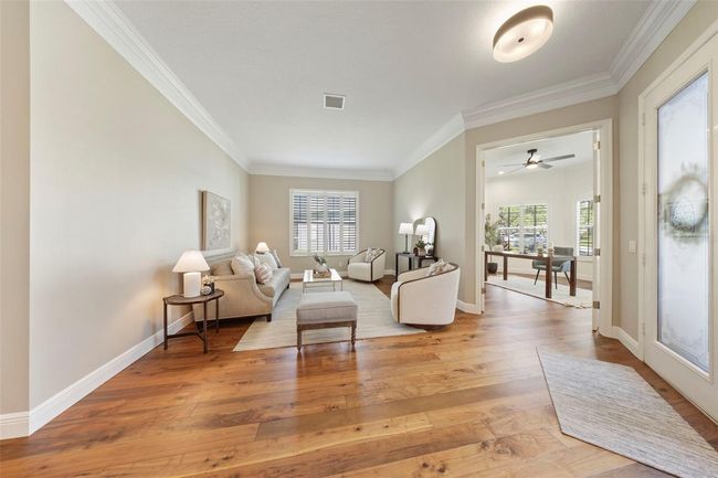 Separate sitting/living room in front of home. | Image 11