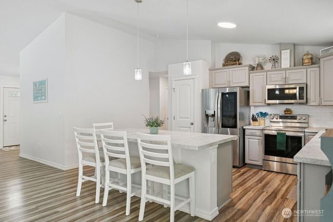 Plenty of area for countertop eating or having time to share with others while cooking. | Image 9