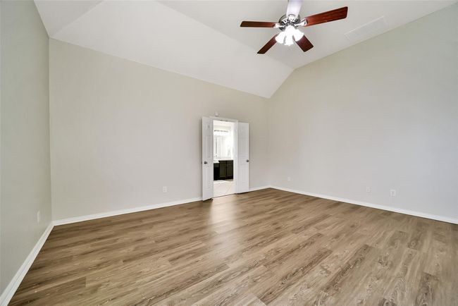 This photo does not give the size of this room justice! Bring your king-sized furniture and still have room for a sitting area all in this tranquil space. | Image 15