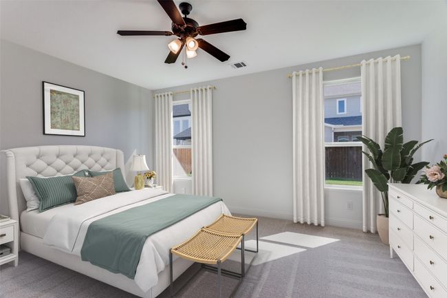 Bedroom featuring carpet, baseboards, and a ceiling fan | Image 10