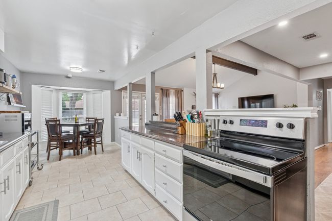 Countertop space for the chef in the family, and a 5-burner smooth surface stovetop! | Image 13