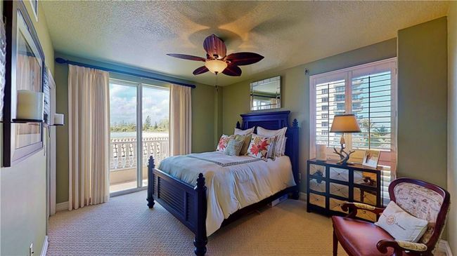 Guest bedroom has west views and beautiful ocean views. Has a private bath. | Image 21