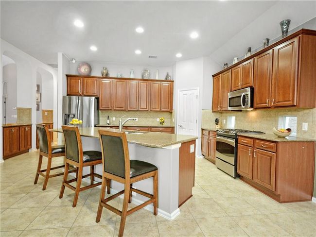 208 Raindance Cv, House other with 4 bedrooms, 3 bathrooms and 4 parking in Austin TX | Image 6