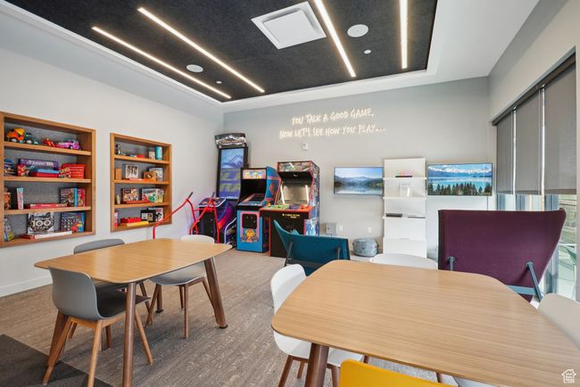 Recreation room with built in shelves | Image 34