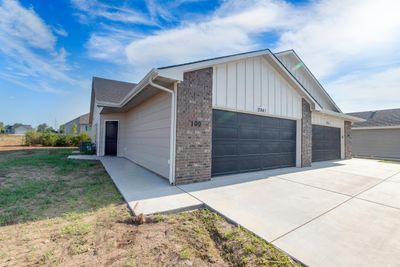 View of property exterior featuring a garage | Image 2