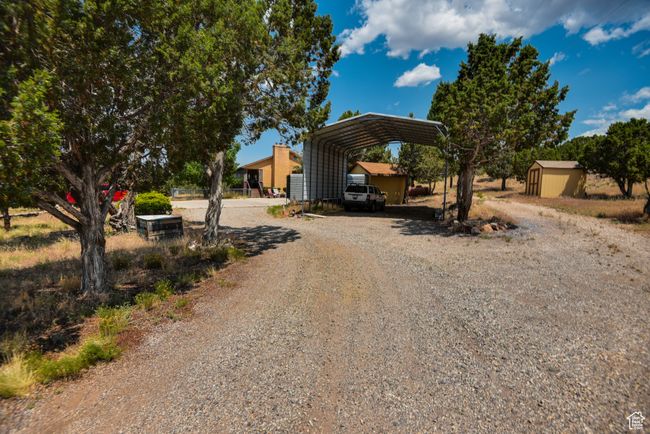 View of dirt / gravel road | Image 11