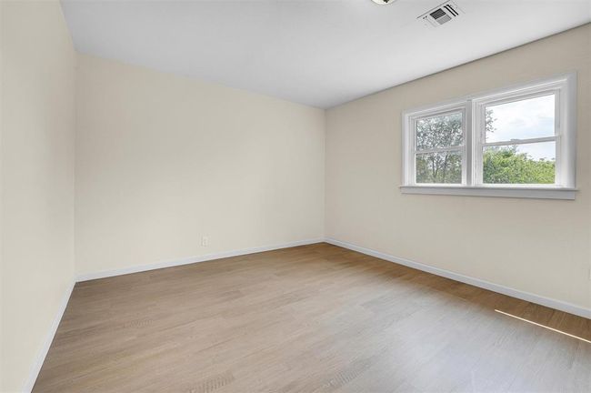 Spare room featuring light hardwood / wood-style flooring | Image 35