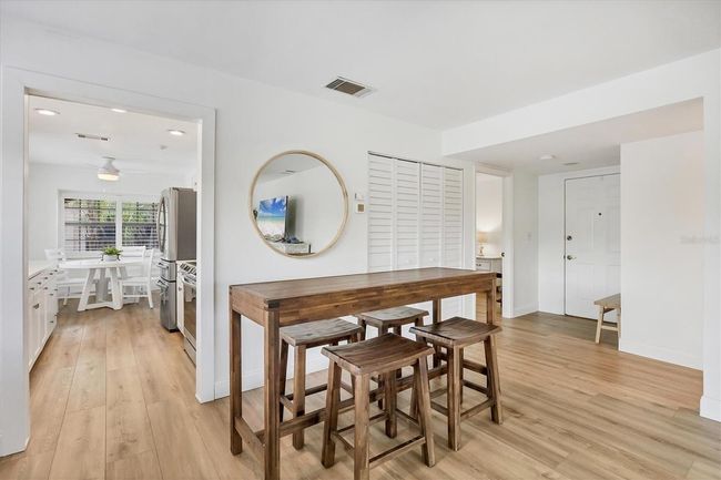 ANOTHER VIEW OF DINING AREA SHOWING DOORWAY TO KITCHEN | Image 10