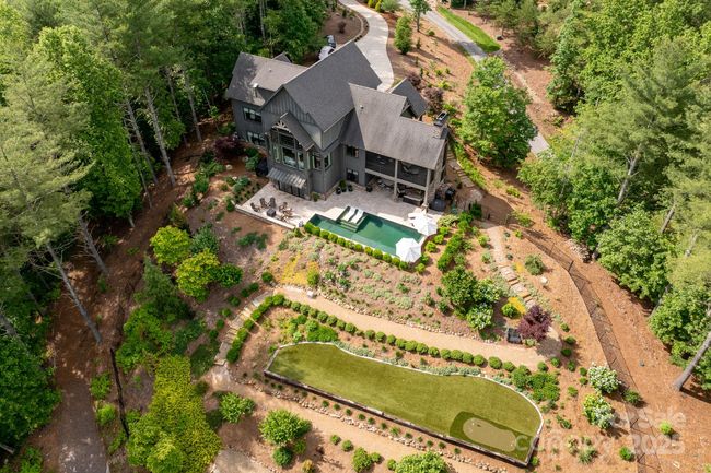 Enchanting landscaping and terraced gardens create your private sanctuary. | Image 35