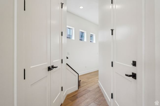 Hallway with recessed lighting, baseboards, and light wood-style floors | Image 23
